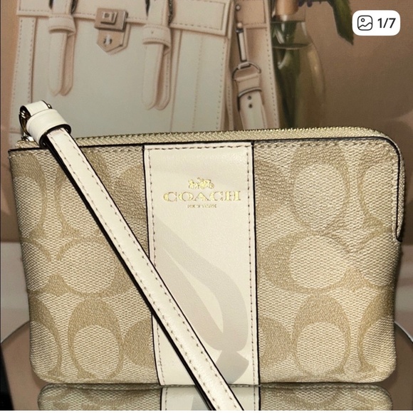 Coach Handbags - Coach Signature Beige and White Wristlet